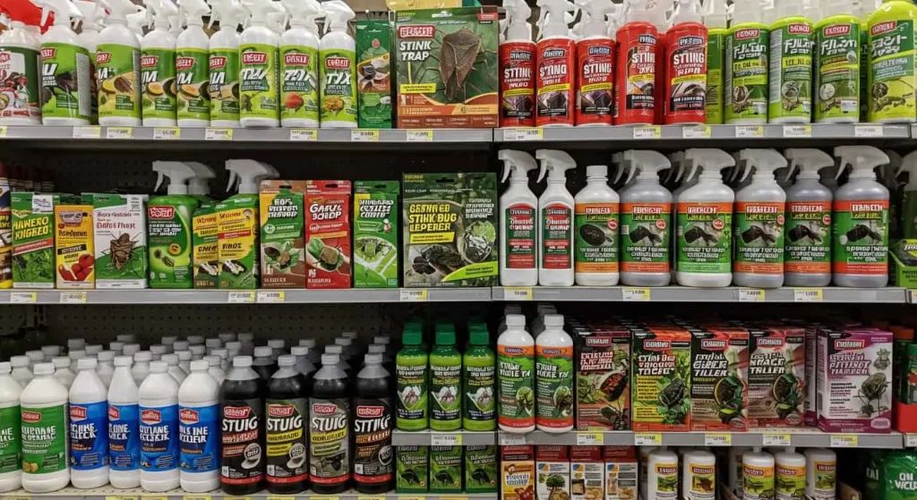 Shelf displaying commercial stink bug repellents, including sprays and traps